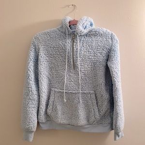 Plush baby blue pullover hoodie.